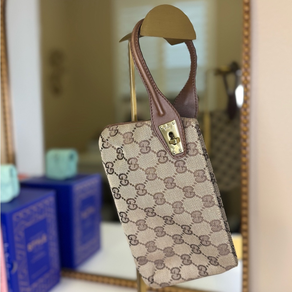 Gucci Monogram wristlet